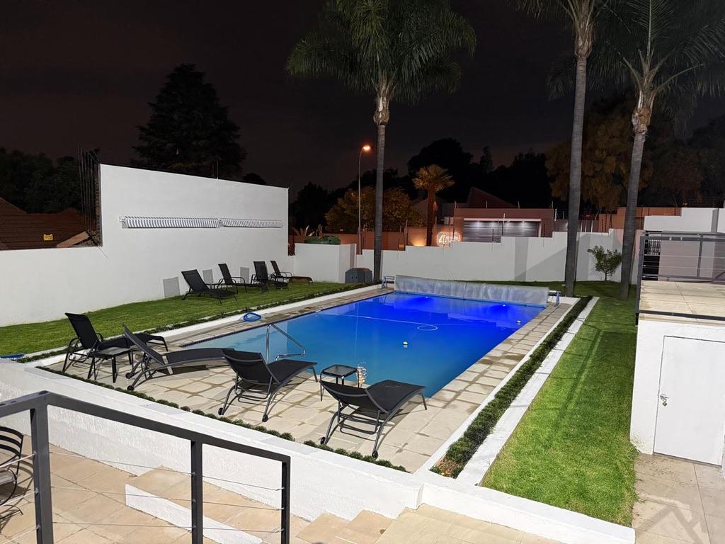 Illuminated pool at night