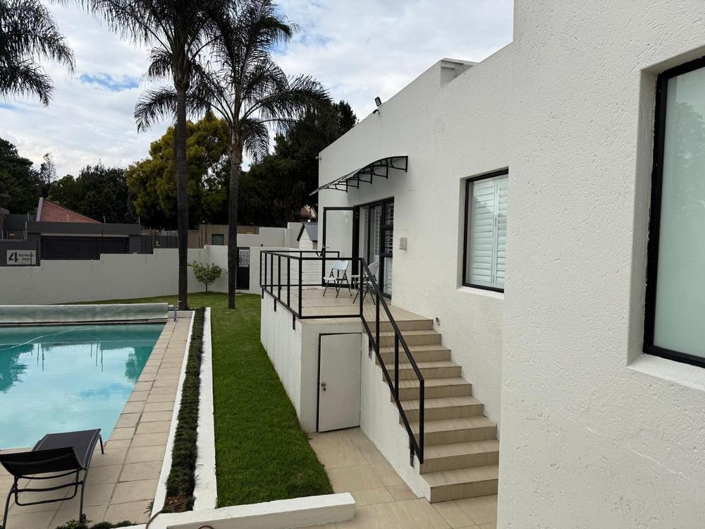 Pool and terrace at Rest and Resus House